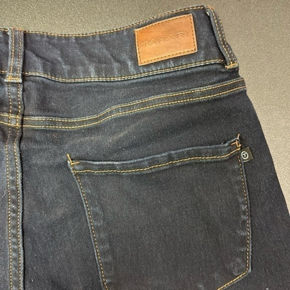 543.   Tahari women’s dark blue mid rise  skinny jeans size 10